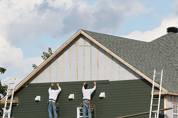 Professional Siding Installation technician working in Vale, OR